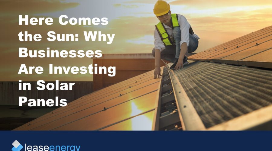 Image of person in high vis and hard hat on a roof installing solar panels, to illustrate the blog post about the benefits of solar panel leasing.