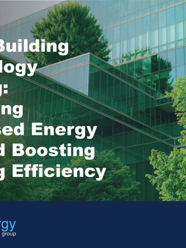a glass building surrounded by trees to illustrate the benefits of smart building technology leasing