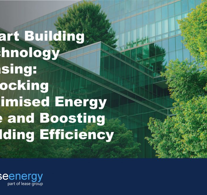 a glass building surrounded by trees to illustrate the benefits of smart building technology leasing