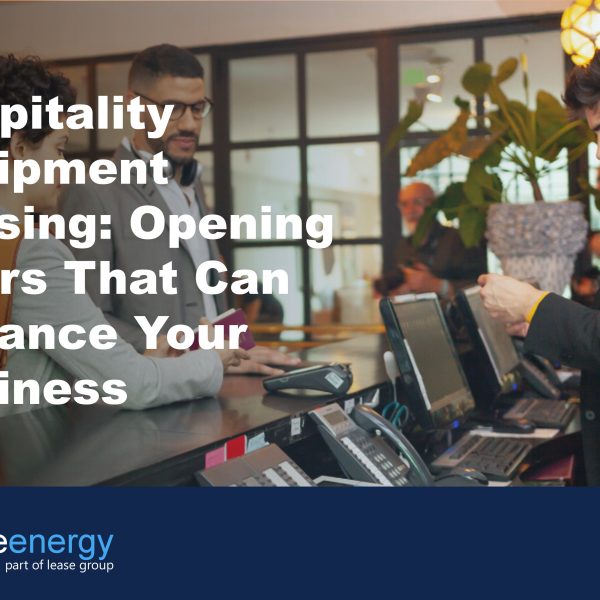 Image of couple checking in to hotel to illustrate how hospitality equipment leasing can be a benefit for hospitality businesses