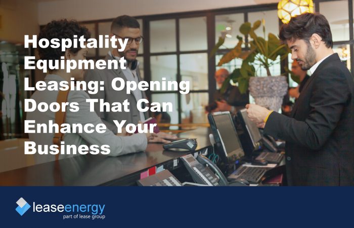 Image of couple checking in to hotel to illustrate how hospitality equipment leasing can be a benefit for hospitality businesses