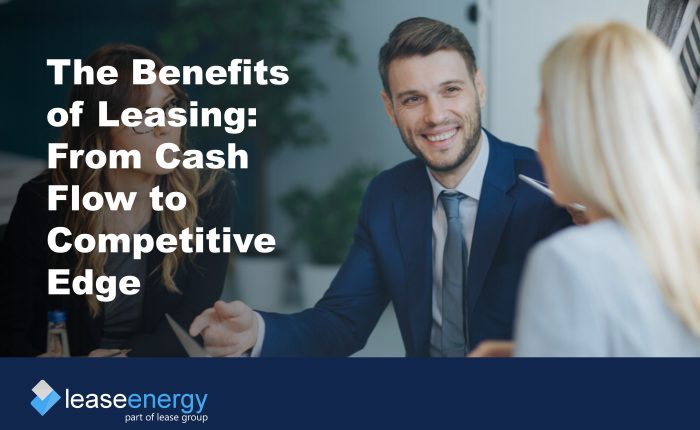 three people talking to illustrate discussing the benefits of leasing