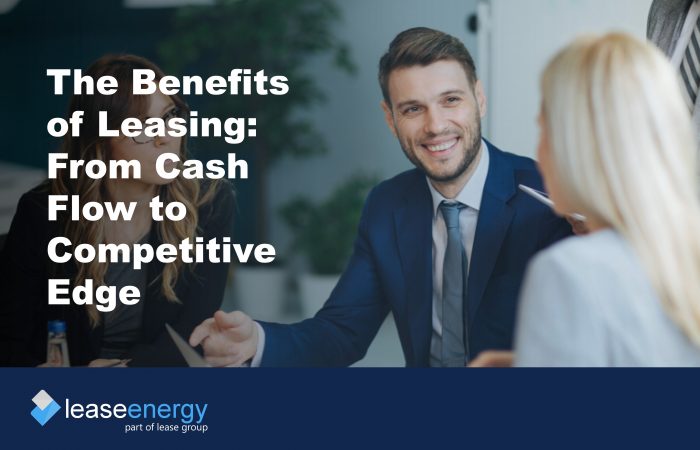 three people talking to illustrate discussing the benefits of leasing
