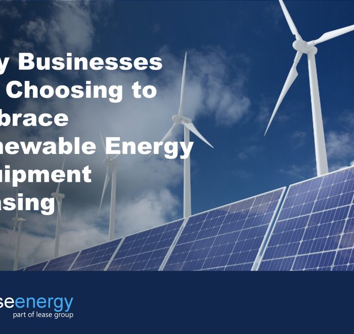 Image of solar panels and wind turbines with a cloudy sky background to illustrate the benefits of renewable energy equipment leasing or finance