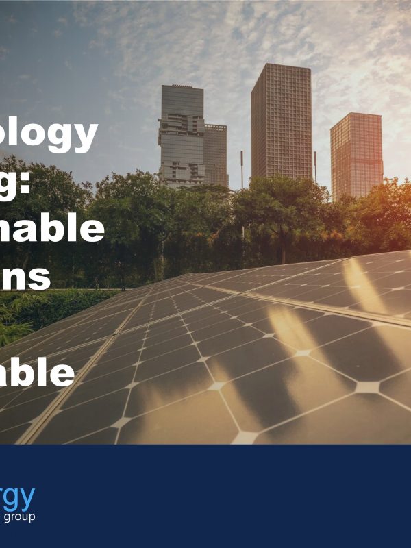Image of solar panels with city scape in the background to illustrate the benefits of green technology leasing to businesses wishing to invest in sustainability